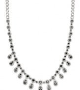 Bold drops add drama to your look. This standout pendant features pear and round-cut black diamonds (6 ct. t.w) set in sterling silver. Approximate length: 18 inches. Approximate drop: 1/2 inch.