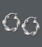 Tired of the same old style? Add a twist! These chic, hoop earrings feature a twisted design in 14k white gold. Approximate diameter: 1-1/4 inches.