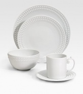 An elegantly detailed cereal bowl is made entirely by hand in fine Limoges porcelain with a raised pearl border. From the Perlee White Collection Porcelain 3H X 5½ diam. Dishwasher safe Imported 