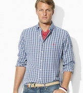 Rendered in soft, lightweight cotton twill, a classic-fitting shirt channels rugged appeal in a handsome plaid pattern.