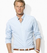 A trim-fitting shirt is crafted from silky cotton poplin in an end-on-end weave with sleek stripes for refined polish.