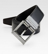 Sartorial sophistication in smooth leather with an engraved nickel buckle. About 1½ wide Leather Made in Italy 