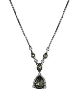 Front and center in fashion. Givenchy shines with this Y-shaped necklace crafted from hematite-tone mixed metal with glass stones adorning it. The pendant glistens with cubic zirconia accents. Approximate length: 16 inches + 2-inch extender.