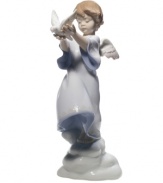 The face of an angel: this precious little cherub is earning his wings by delivering a peace dove to those in need. Beautifully crafted of smooth porcelain from Lladro.