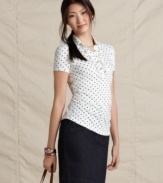 A springtime essential is enlivened by polka dots in this Tommy Hilfiger look. Pair this polo with anything from slim skirts to crisp khakis!