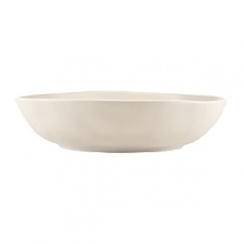 Featuring an organic shape and a matte glaze finish, this serving bowl is thoroughly modern and imparts natural sophistication.