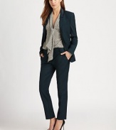 Flawlessly tailored blazer in a lengthy silhouette with front besom pockets and a back vent for easy movement. Notched shawl collarLong sleeves with buttoned cuffsFront besom pocketsSingle button closureBack ventFully linedAbout 26 from shoulder to hemBody: Polyester/viscose/elastaneContrast: PolyesterDry cleanImportedModel shown is 5'10 (177cm) wearing US size 2.