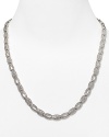 Shape meets sparkle on this silvery link necklace from Lora Paolo, featuring inset crystals and a delicate oval design. It's classic lines make it an elegant accessory for evening.