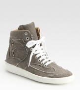 Sporty lace-up silhouette enlivened by a high-top canvas upper and distressed stitching. Rubber platform, 1 (25mm)Canvas upperLeather liningRubber solePadded insoleImported