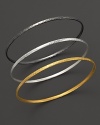 Three arresting tones, three beautiful bangles from Gurhan, crafted in hammered 24 Kt. yellow gold, white silver and dark silver.