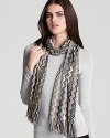 Missoni's signature zig-zag print meets the warmth of wool with this black, gray and cream scarf.