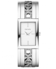 Glitzed up glamour with a polished look from DKNY. Watch crafted of stainless steel bangle bracelet with DKNY logo accented with 92 clear crystals and rectangular stainless steel case. White dial features applied silver tone stick indices at twelve, three, six and nine o'clock, two hands and logo at twelve o'clock. Quartz movement. Water resistant to 30 meters. Two-year limited warranty.