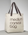 Medium cotton canvas bag. This sturdy tote bag is made from untreated, undyed, recyclable cotton canvas and is ideal to carry everything and for grocery shopping. Hand-print logo with non-toxic water-based ink. Double shoulder straps. Open top. Interior zip pocket. Unlined.