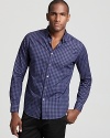 Gingham goes from stuffy to smooth with this slim fit button down from Theory featuring a multi-blue print.