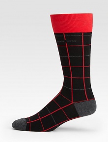 A captivating grid pattern lends modern flair to this simple dress sock shaped in a generous cotton blend with a hint of stretch for maximum comfort and support.Mid-calf heightCotton/polyamide/modal/elastaneMachine washImported