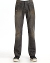 Slightly fitted, yet exceptionally comfortable, this slim-fit cotton denim classic has minimal fading, torn spots and a versatile black rinse.Mid-width waistband with belt loops Front zipper and button fly Five-pocket style Contrast stitching and logo patch at backpocket Inseam, about 34 Cotton; hand wash or machine wash Imported