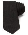 Knot this tonal tie for a dapper look that suits the summer and can be worn all year round, too.