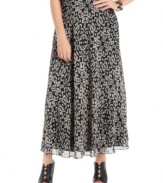 An allover global-inspired print makes this DKNYC maxi skirt a perfect pick for a stylish summer look!