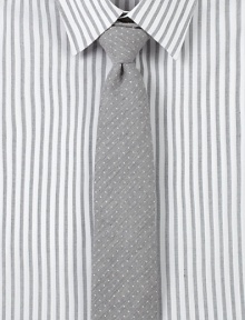 Slightly textured pindot tie adds finishing touches to any modern dress wardrobe.57% cotton/43% silkDry cleanMade in USA