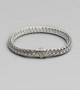 From the Classic Chain Collection. A beautiful weave of sterling sterling silver strands with a matching clasp. Sterling silver Length, about 7½ Width, about ¼ Push-lock clasp Made in Bali