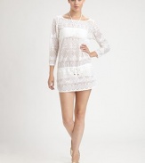 This lacy layer doubles as a beach coverup and as a tunic over a camisole or tank for a feminine look.Wide rounded necklineThree-quarter sleevesDrawstring waistContour side hem78% polyester/22% spandexHand washImported