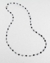 From the Bijoux Collection. A long elegant sterling silver strand of black onyx and hematite beads.Black onyx, hematite Sterling silver Length, about 40 Toggle closure Imported