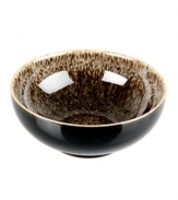 More than meets the eye, Denby's Praline cereal bowl boasts standout durability in addition to style. With a distinct silhouette in casual stoneware and unique speckled glaze.