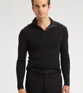 Crafted from luxurious Italian merino wool, this trim-fitting sweater zips down to reveal a sumptuous matte leather lining at the snapped mockneck collar.MockneckZip placketMerino woolDry cleanImported