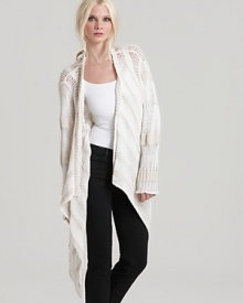 A lofty layering piece, this Rachel Zoe crochet cardigan features an easy, draped collar and tonal stripes for casual chic style that's complete with an angled, asymmetric hem.