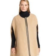 Calvin Klein makes this cape fashion-forward with faux leather trim and a zip front closure.