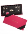 Stay organized with some edge with this studded leather wallet from Juicy Couture. Outfitted with multiple pockets and compartments, it discretely slips inside a satchel or tote for effortless go-everywhere accessorizing,