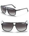 Protect your eyes in style with these sharp, smoke-tinted navigator sunglasses from Carrera.