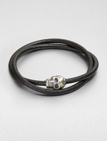 Silver skull accent joins together a double strand of smooth, genuine leather.LeatherSterling silverAbout 2½ diam.Made in the United Kingdom