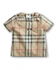 Teach little ones to appreciate classic design at a young age with timeless British cool from Burberry--the Tyra blouse features clean lines, charming button details and the brand's signature check print.