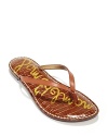 Sam Edelman takes the classic flip flop luxe in tanned leather with a croc-embossed footbed.