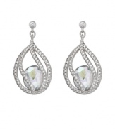 Polish your look with subtle refinement. Crystal Moonlight is encapsulated by intricate strands of clear Swarovski crystal pavé. This exquisite pair of silver tone mixed metal pierced earrings adds glamour to every look. Approximate drop: 1-3/8 inches.