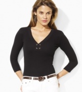 Crafted in tried-and-true waffle-knit cotton for lightweight comfort, this cozy three-quarter-sleeved essential from Lauren Jeans Co. exudes chic style with gold-tone hardware and lace-up detailing at the front.