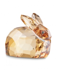 Sparkly rabbit. The Swarovski hare figurine has a faceted crystal fleece and golden brown hue that's sure to warm any collector's heart.