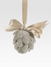 A glittery ornament for the discerning collector, carefully handcrafted in Tuscan artichoke-shaped glass glitter with a satiny ribbon loop. Ribbon loop Glass glitter 5H X 5 diam. Handmade in USA 