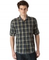 A cool plaid pattern gives this laid-back shirt from Calvin Klein instant Friday-night status.