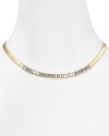 ABS by Allen Schwartz makes a subtle nod to the collard necklace with this baguette chain. Gleaming gold and delicate stations give this flat piece sparkly dimension.