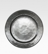 A unique mottling technique lends a hand-thumbed, hammered design to a beautiful metallic stoneware dinner plate with the look of an old-world favorite. From the Pewter Collection11 diam.Ceramic stonewareDishwasher safeImported