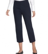 Crisp and clean, these chic capri pants from Jones New York Signature feature side zip styling and a flattering stretch fit.