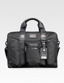 A slim design tailor-made for easygoing professionals in signature ballistic nylon with interior organization and plenty of room for papers and files. Zip closure Top handles Adjustable shoulder strap Exterior zip pockets Interior zip, slip pockets Nylon with leather accents 16W X 12H X 5D Imported 