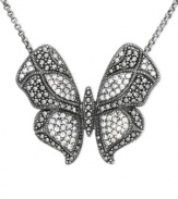 Soar to stylish heights. This sterling silver necklace features a butterfly pendant adorned with round-cut marcasite and crystals for a whimsical touch perfect on any occasion. Approximate length: 16 inches + 2-inch extender. Approximate drop length: 1-1/2 inches. Approximate drop width: 1 inch.