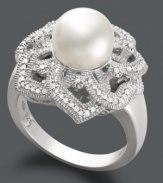 Style inspired by nature. This exquisite ring features a delicate floral design with sparkling, round-cut diamond petals (1/5 ct. t.w.) and a cultured freshwater pearl center (8-9 mm). Crafted in sterling silver. Size 7.