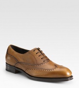 EXCLUSIVELY AT SAKS. Luxurious saddle calfskin boasts lace-up styling and wingtip perforations.Calfskin upperLeather liningPadded insoleLeather soleMade in Italy