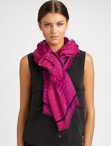 A vivid croc print and contrasting stripe with logo detail define this eye-catching wrap.Modal55 X 77Dry cleanImported