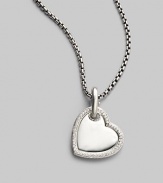 From the Heart Collection. A pretty enhancer, edged with stunning pavé diamonds is a true gift from the heart. Diamonds, 0.38 tcw Sterling silver Pendant width, about 1 Imported Please note: Chain sold separately.