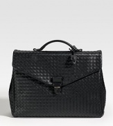 Superior craftmanship and timeless style defines this silhouette crafted from smooth calfskin leather with iconic woven detail.Flap closure with lockTop handleInterior slip, zip pocketsFully lined15¾W x 10¼H x 3½DMade in Italy